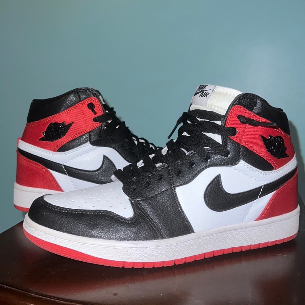 Red, Black and White Nike Jordan’s